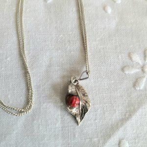 Sterling silver pendant with lady bug on leaf. Made in Italy.